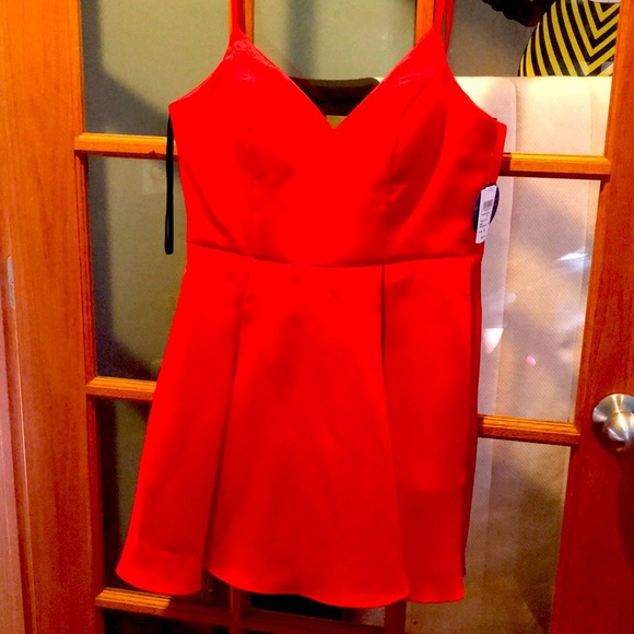 Windsor Dresses & Skirts - Red spaghetti strap dress. Never worn. With hidden side pockets.